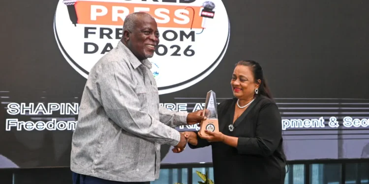 Prime Minister Brigadier (Ret’d) Mark Phillips hands over lifetime achievement award
