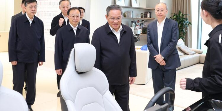 Chinese Premier Li Qiang, also a member of the Standing Committee of the Political Bureau of the Communist Party of China Central Committee, visits a sci-tech enterprise during an inspection tour in Beijing, capital of China, May 18, 2026. (Xinhua/Huang Jingwen)