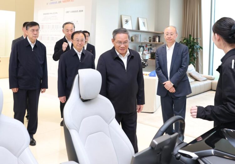 Chinese Premier Li Qiang, also a member of the Standing Committee of the Political Bureau of the Communist Party of China Central Committee, visits a sci-tech enterprise during an inspection tour in Beijing, capital of China, May 18, 2026. (Xinhua/Huang Jingwen)