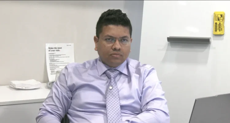 Economist Joel Bhagwandin speaking on the impacts of establishing the Guyana Development Bank