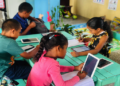 Students at the Paramakatoi Learning Pod, Region 8, engaging in a hands-on technology session, made possible through MODEC's continued sponsorship of STEMGuyana's Learning Pods programme