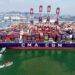 An aerial drone photo taken on June 9, 2026 shows a cargo ship berthed at Qingdao Port in Qingdao, east China's Shandong Province.  (Photo by Yu Fangping/Xinhua)