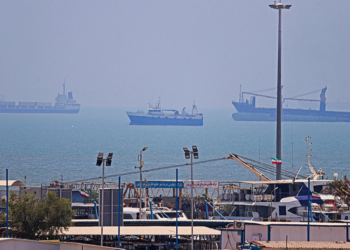 Vessels anchored in Bandar Abbas along the Strait of Hormuz, June 18, 2026. /VCG
