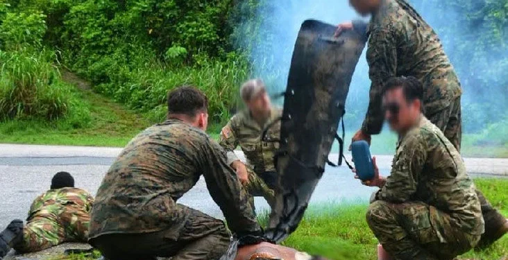 INTENSE: A United States Special Operations Combat Medic and participants from the Trinidad and Tobago Defence Force (TTDF) successfully concluded a four-day Tactical Combat Casualty Care (TCCC) exchange at Teteron Barracks, held from June 15-18. Participants from the TTDF and interagency partners worked together through intense, realistic trauma scenarios, focusing on casualty assessment, treatment and evacuation. See Page 5 —Photo: US Embassy