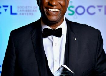 Professor Justice (Retired) Courtney A. Abel displays the inaugural Lifetime Achievement Award presented by the Society of Caribbean Lawyers (SOCAL) at its Spring Gala 2026 in London, England.