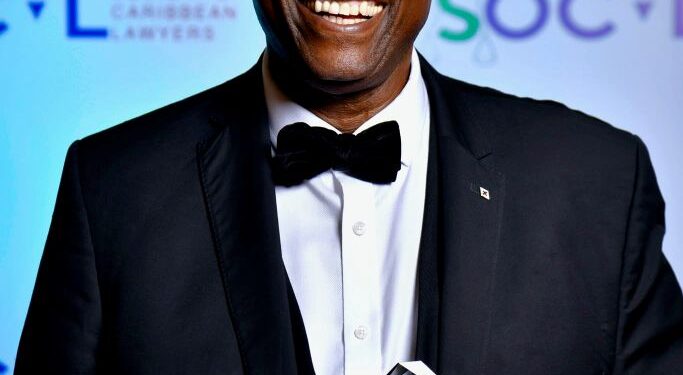 Professor Justice (Retired) Courtney A. Abel displays the inaugural Lifetime Achievement Award presented by the Society of Caribbean Lawyers (SOCAL) at its Spring Gala 2026 in London, England.