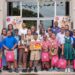 Executive Director of GNBS, Trevor Bassoo, flanked by finalists of the competition, teachers, parents and representatives from GNBS