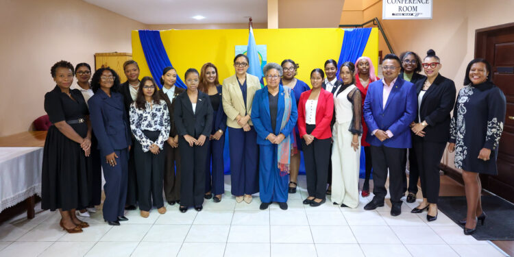 CARICOM Secretary-General, Dr Carla Barnett (centre), flanked by the honourary diplomats, officials of the CARICOM Secretariat, High Commissioner of Belize to Guyana, and Director General of Imperial House, Guyana.