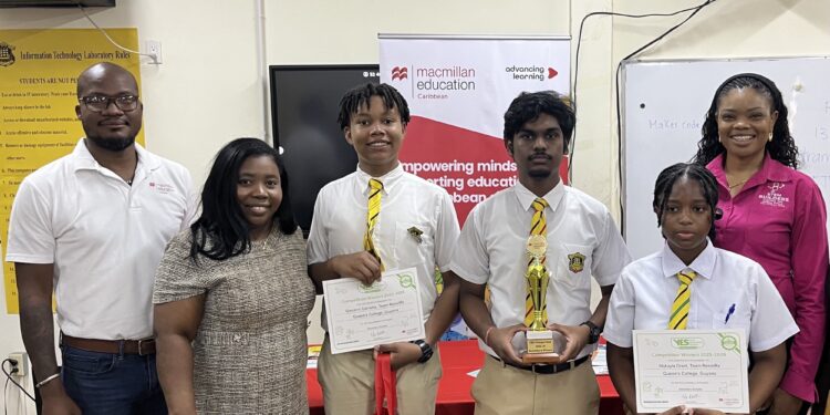 Jamaican STEM educator Kavelle Hylton (right) and Macmillan Education Caribbean Regional Officer Alex Holder (left) join students from Queen’s College following the presentation ceremony held after Wednesday’s STEM workshop.