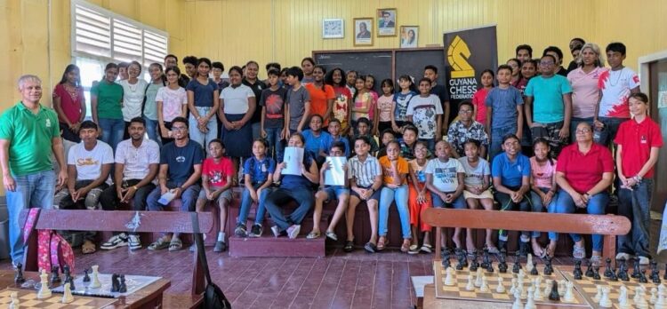Leguan Chess participants with GCF coaches