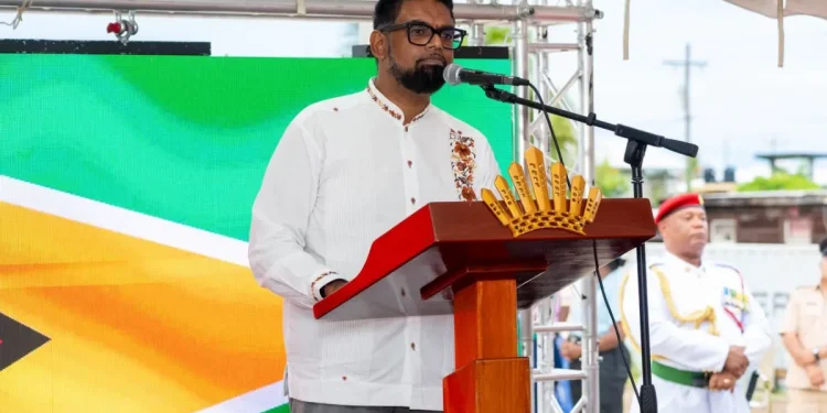 President Dr Mohamed Irfan Ali addresses workers at the ceremony commemorating Enmore Martyrs Day on Tuesday