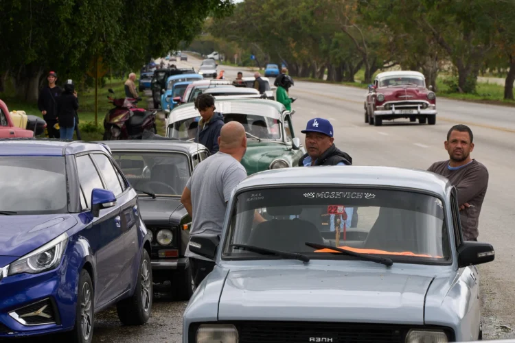Drivers wait in a long line to enter a gas station in Bacuranao near Havana, Cuba, Jan. 30, 2026. (AP Photo/Ramon Espinosa, File)