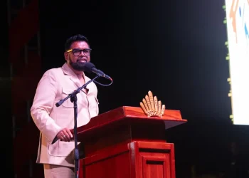 President Dr Mohamed Irfaan Ali addresses the opening ceremony of the International Building Expo at the Guyana National Stadium in Providence