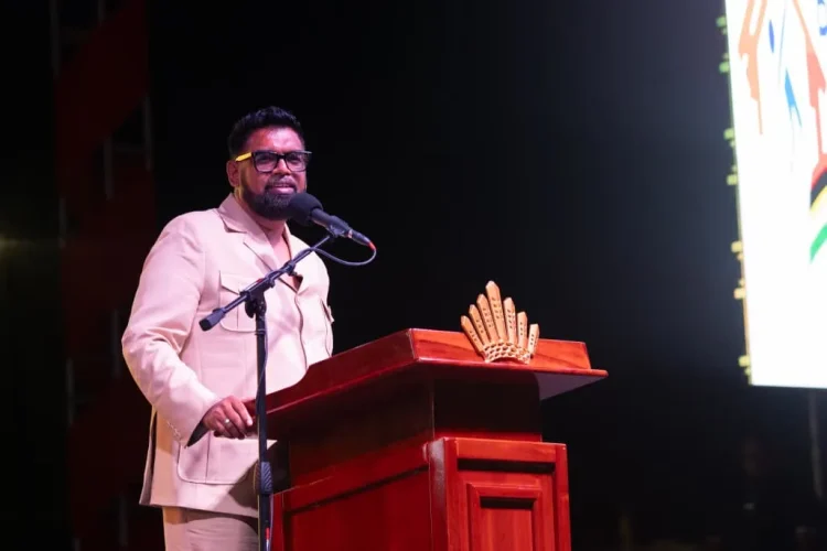 President Dr Mohamed Irfaan Ali addresses the opening ceremony of the International Building Expo at the Guyana National Stadium in Providence
