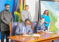 President Dr. Irfaan Ali and Jamaican Prime Minister Dr. Andrew Holness witness the signing, on Friday at State House, of three Memoranda of Understanding intended to deepen cooperation between Guyana and Jamaica in agriculture, defence and security, and financial services (Office of the President photos)