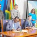President Dr. Irfaan Ali and Jamaican Prime Minister Dr. Andrew Holness witness the signing, on Friday at State House, of three Memoranda of Understanding intended to deepen cooperation between Guyana and Jamaica in agriculture, defence and security, and financial services (Office of the President photos)