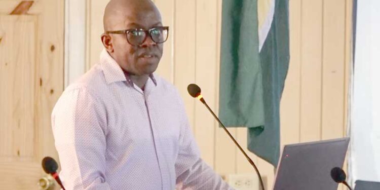 Engineer Patrice Jacobs on Monday presenting his automated koker proposal to the Mayor and City Council of Georgetown (Guyana Chronicle photo)