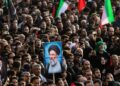 People attend a funeral ceremony for Iran's late Supreme Leader Ali Khamenei in Qom, Iran, July 7, 2026. (Mehr News Agency/Handout via Xinhua)