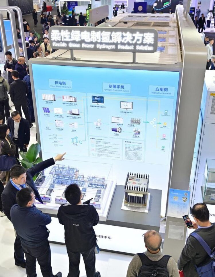 Visitors learn about the flexible green power hydrogen product solution of China Railway Rolling Stock Corporation (CRRC) during the 14th Energy Storage International Conference and Expo (ESIE) in Beijing, capital of China, April 2, 2026. (Xinhua/Yin Dongxun)