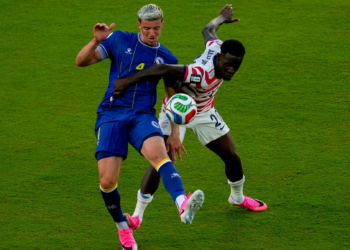 United States' Folarin Balogun (R) fouls Bosnia and Herzegovina's Tarik Muharemovic during the World Cup round of 32 soccer match between the United States and Bosnia in Santa Clara, California, US, July 1, 2026. /VCG