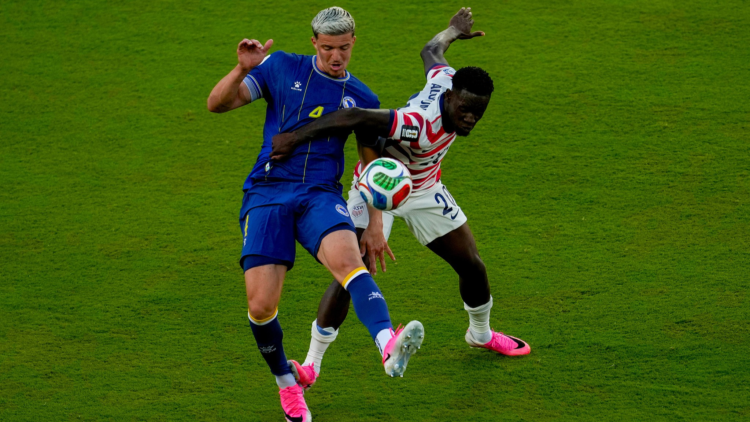 United States' Folarin Balogun (R) fouls Bosnia and Herzegovina's Tarik Muharemovic during the World Cup round of 32 soccer match between the United States and Bosnia in Santa Clara, California, US, July 1, 2026. /VCG