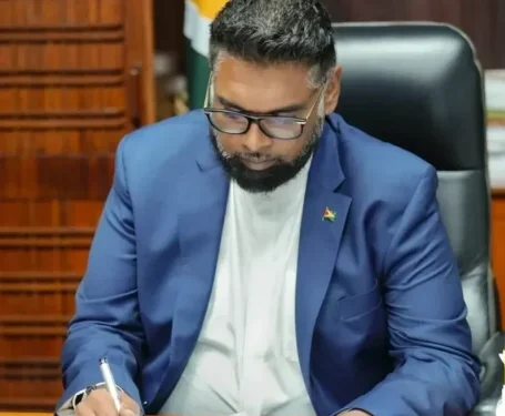 President Dr Irfaan Ali signs the Guyana Development Bank Act
