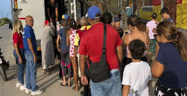 HELP FROM T&T: Concerned Muslims of Trinidad and Tobago (CMTT), in collaboration with Helping Hands USA and Muslim Hands UK, distribute approximately US$20,000 worth of hampers yesterday to families affected by last month’s earthquakes in Güiria, Venezuela.