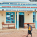A woman walks past a hospital in Bunia, Democratic Republic of Congo, on July 3. The facility is a designated site scheduled to host clinical trials for Ebola treatments. DIROLE LOTSIMA DIEUDONN/AP