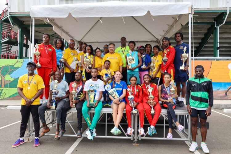 CARICOM Secretary‑General Dr Carla Barnett (second row, ninth from right), Deputy Secretary‑General Dr Armstrong Alexis (front row, far left), and Saint Lucia’s Minister for Education, Youth Development, Sports and Digital Transformation, the Honourable Kenson Casimir (second row, eighth from right), pictured with winners alongside CARICOM and government officials