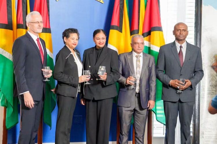 Four of the five Commissioners for the MV Barima COI. Principal Magistrate Judy Latchman centre