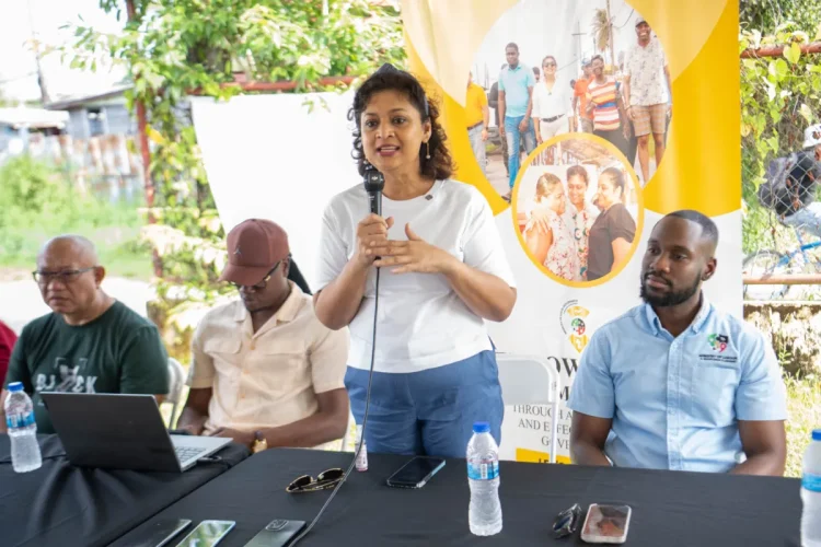 Minister of Local Government and Regional Development Priya Manickchand speaks with vendors at the East Ruimveldt market