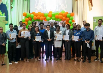 Minister of Tourism, Industry and Commerce, Susan Rodrigues, with recipients of the grants