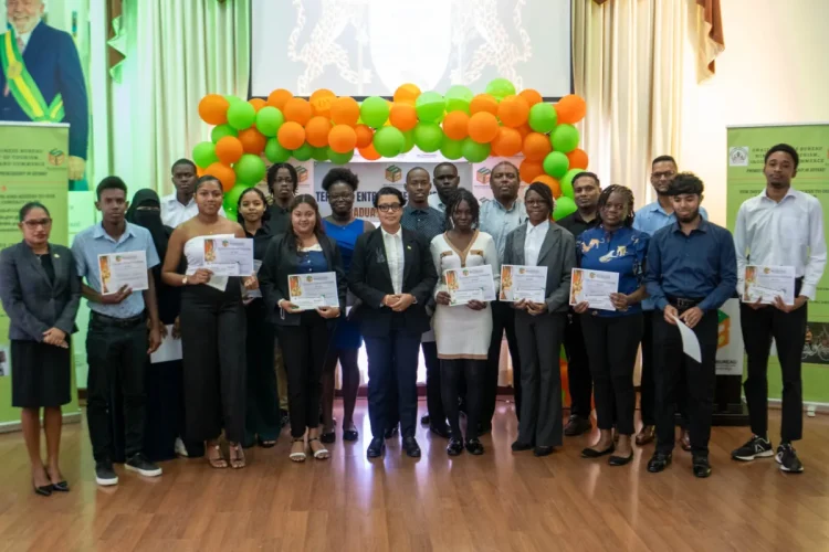 Minister of Tourism, Industry and Commerce, Susan Rodrigues, with recipients of the grants