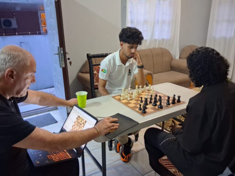 GM Aleksa Strikovic (C) in training session with Kyle Couchman and WCM Jessica Callendar