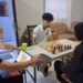 GM Aleksa Strikovic (C) in training session with Kyle Couchman and WCM Jessica Callendar
