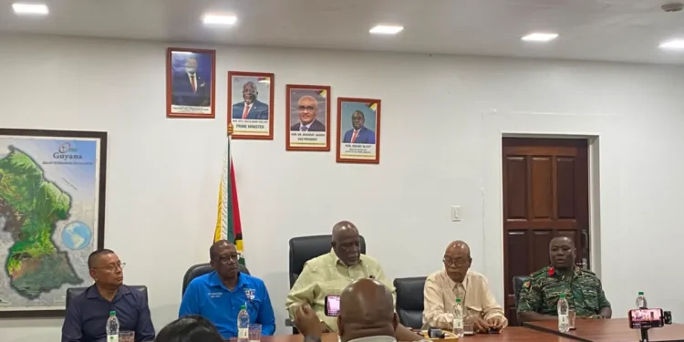 Prime Minister Brigadier (Ret’d) Mark Phillips, Minister of Public Works, Bishop Juan Edghill and key stakeholders during a pres briefing on Tuesday (dpi photo)