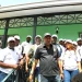 Members of Haiti’s government with the 31-person volunteer medical mission prepare to board a flight to Venezuela on July 7, carrying 5.5 tons of medical supplies to assist communities affected by twin earthquakes.