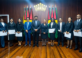 President Irfaan Ali, flanked by Attorney General Mohabir Anil Nandlall, SC, and the six newly appointed Puisne Judges