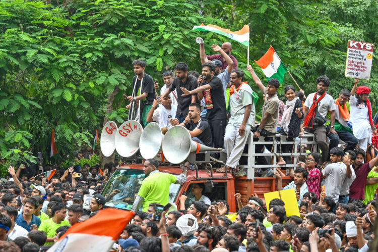 NEW DELHI, INDIA - JULY 20: Abhijeet Dipke, founder of the Cockroach Janta Party (CJP), participates in a protest march towards Parliament from Jantar Mantar on July 20, 2026 in New Delhi, India. The march, held amid heavy security arrangements, drew thousands of supporters demanding action over alleged examination paper leaks and reforms in the education system. (Photo by Sanchit Khanna/Hindustan Times via Getty Images)