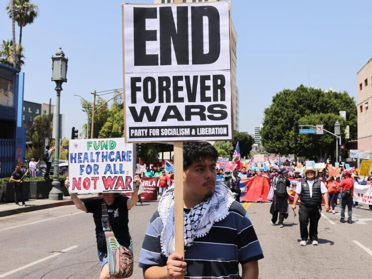 Demonstrators holding placards take part in a May Day rally in Los Angeles, California, the United States, on May 1, 2026. (Photo by Qiu Chen/Xinhua)