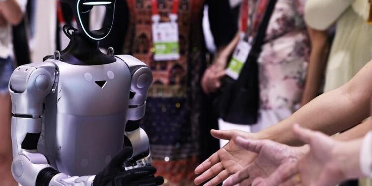 Visitors interact with a robot from Unitree Robotics during the sixth China International Consumer Products Expo (CICPE) in Haikou, South China's Hainan province, April 14, 2026. [Photo/Xinhua]
