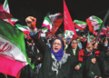 A pro-government demonstrator chants slogans during a gathering in a square in Tehran on Wednesday. VAHID SALEMI/AP