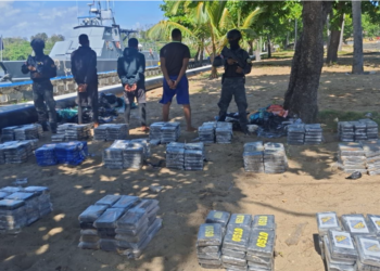 In the foreground are quantities of drugs seized during the operation (Photo via CARICOMIMPACS)