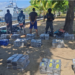 In the foreground are quantities of drugs seized during the operation (Photo via CARICOMIMPACS)