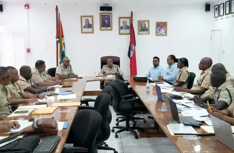 The Guyana Police Force and Environmental Protection Agency during a recent consultation (photo) Guyana Chronicle