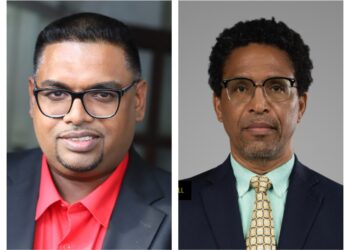 L-R President Irfaan Ali, Dr. Terrence Campbell MP (APNU)