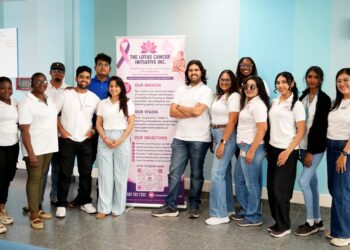 Staff of The Lotus Cancer Initiative Inc., the Ministry of Health, and Oxford Medical Centre pose for a group photograph during the recently concluded cancer screening and diagnostic outreach at the Enmore Regional Hospital.