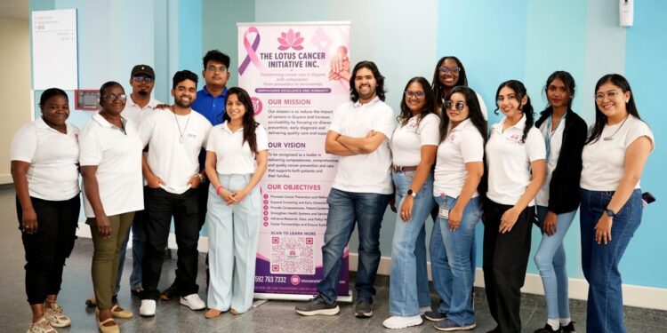 Staff of The Lotus Cancer Initiative Inc., the Ministry of Health, and Oxford Medical Centre pose for a group photograph during the recently concluded cancer screening and diagnostic outreach at the Enmore Regional Hospital.