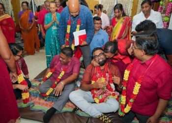 President Irfaan Ali (centre) at a relgious function