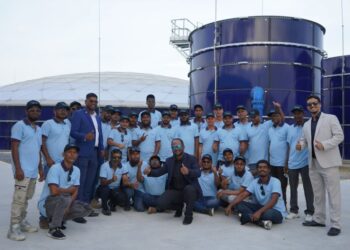 President Irfaan Ali's brother, Aqtar Ali (third from left) with Sigma Team (Opposition Leader Azruddin Mohamed's photo)